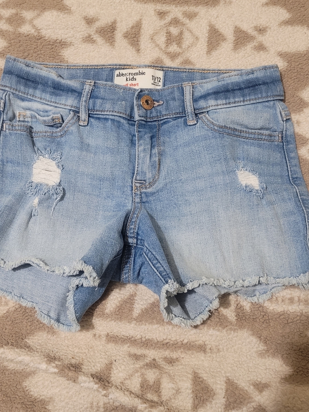 abercrombie kids faded blue distressed denim cutoffs